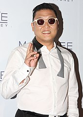 Psy, whose music video for "Gangnam Style" in December 2012 became the first to reach more than a billion YouTube views Psy 2012.jpg