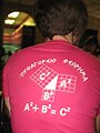 A high school student (presumably) wearing a red Pythagorean theorem t-shirt.