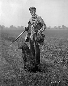 Snowden Slights with retriever and shotgun around 1910, 'the last of Yorkshire's Wildfowlers' Snowden Slights, front view YORYM-S13.jpg