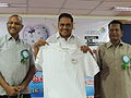 Chief Guest of the Day, Mandali Buddha Prasad releasing T-shirt