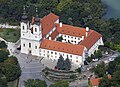 A church with a walled courtyard