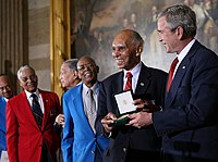 The Congressional Gold Medal was collectively presented to approximately 300 Tuskegee Airmen or their widows, at the U.S. Capitol rotunda in Washington, D.C. by President George W. Bush on March 29, 2007.