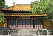 Puji Temple is the current name of the temple formerly called Unwilling to Leave Guanyin Temple. It is the site where a fisherman by the surname of Zhang, first moved and housed the sacred statue of Guanyin left behind by Egaku near the Cave of Tidal Sounds.