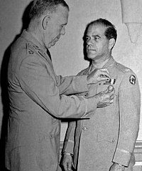 Frank Capra receiving the Distinguished Service Medal from General George C. Marshall, 1945 Capra-Army-45.jpg