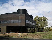 The west wing of the AIATSIS building designed by Ashton Raggatt McDougall, is a black replica of Le Corbusier's iconic Villa Savoye. Institute of Aboriginal Studies, Canberra 2007.JPG