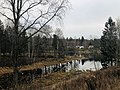 Petersøya og Storelva sett fra Søndre park, med Støalandet i bakgrunnen.