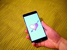 Since the 2010s, Internet dating has become more popular with smartphones. Smartphone dating app illustration.jpg