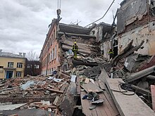 School No. 18, bombed the same day Ukrainian rescuers check the remains of a school in Chernihiv (1).jpg