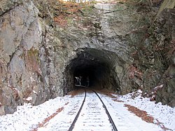 The portal of a single-track railway tunnel
