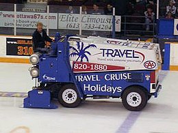 A Zamboni ice resurfacer lays down a layer of clean water, which will freeze to form a smooth ice surface. Zamboni ice resurfacer.jpg