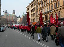 Swedish Social Democratic Party at May Day demonstration in Stockholm, Sweden, in 2006. The party has dominated Swedish politics for nearly a century. The trade union palace in Stockholm is seen at the end of the picture. 1maj2006soc.dem.sthlm.jpg