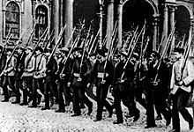 Russian anarchist militiamen marching in formation during the 1917 Revolution A Voros Garda Petervaron 1917-ben.jpg