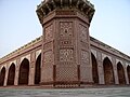 Bases of the minarets feature fine پرچین‌کاری detail.