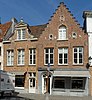 Stadswoningen met winkel