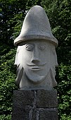 hlava s čtyřmi tvářemi označovaná jako Svantovít, přestože klobouk je inspirován zbručským idolem