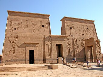 The well preserved first pylon at the Temple of Isis in Philae, serving as a monumental gateway to the temple complex