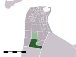 The town centre (dark green) and the statistical district (light green) of Julianadorp in the municipality of Den Helder.