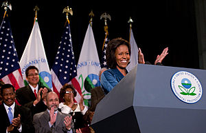 First Lady Michelle Obama applauds the staff m...