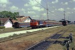 BB301 18 hauling a passenger train at Madiun in 2003