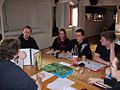 Image 6A group playing a tabletop RPG. The GM is at left using a cardboard screen to hide dice rolls from the players. (from Role-playing game)