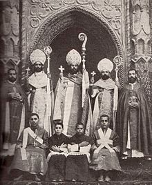 Coptic Catholic clergy and altar servers wearing Latin mitres and surplices in Egypt, 1900 1900 Koptisch Katholische Hierarchie.jpg