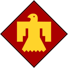 A yellow Thunderbird graphic on a red diamond