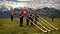 Image 17Some of the traditional symbols of Switzerland: the Swiss flag, the alphorn and the snow-capped Alps (from Culture of Switzerland)