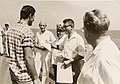 רב חובל של המכלית זאב הלל, רב חובל אנריקו לוי וסגל בית הספר פוגש את אדיר כרמי בוגר מחזור א' בביקור במכלית פטריה 1958