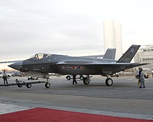 The first F-35A prototype, AA-1, being towed to its inauguration ceremony on 7 July 2006 F-35A - Inauguration Towing.jpg