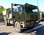 The IVECO Pegaso 6x6 artillery tractor that carries the ammunition, supplies and gun crew.