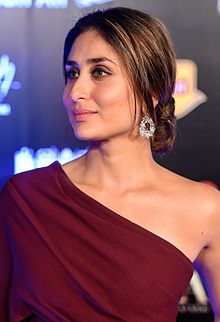 Kareena Kapoor Khan is smiling away from camera.