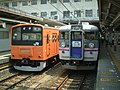A 165 series EMU (right) on a Shinkansen Relay service, August 2001