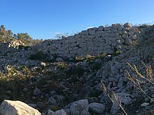Remains of a fortified village, Borg in-Nadur, Malta. Borg in-Nadur is a notable example of Bronze Age fortifications. Borg in-Nadur ruins.jpeg