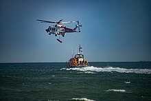 Coastguard 175 from Lee-on-Solent during winch rescue training with the RNLI Bembridge ALB. CG175 helicopter winching.jpg