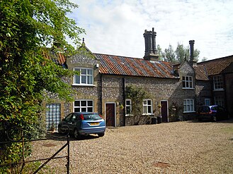 The service buildings on the east range of the hall.