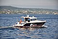 Kantonspolizei Zürich speedboat nearby Horgen, as seen from the ZSG paddle steamship.