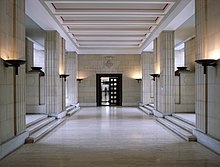 The University of London Press is located in the art-deco style Senate House in London, whose entrance hall is shown above. Inside Senate House.jpg