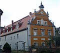 Wohnstallhaus und rückwärtige Scheune, später zum Wohnhaus umgebaut, eines Bauernhofes