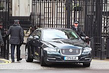 Jaguar XJ at Downing Street, 2014 London March 3 2014 009 Downing Street Gates Open (12912560724).jpg