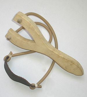 English: Wooden slingshot with rubber made in ...
