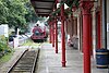 The Pallot Museum train arrives at the station platform in 2009