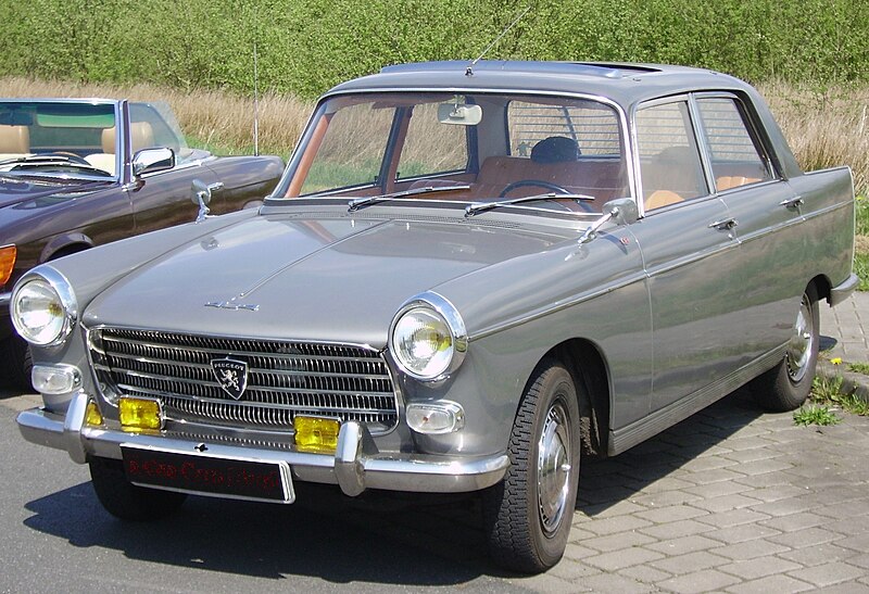 I got a 1967 Peugeot 404 that I m thinking of lowering and putting some old 
