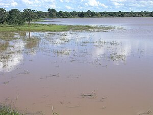 Dam at Silonga, buildings of the village in the background