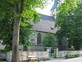 Kath. Pfarrkirche St. Pankratius Störmede mit Kirchplatz mit Natursteinmauerwerk-Einfriedung, historischem Pflaster der Wege, reichem alten Baumbestand (Linden und Kastanien) und dem auf dem ehem. Friedhof stehenden Grabsteinen aus dem 19. Jh.