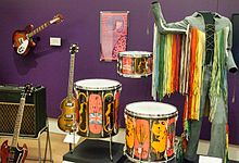 Collection of Who memorabilia including guitars and clothes