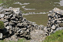 Entrance through the dry-stone rampart, Tre'r Ceiri hillfort, Gwynedd