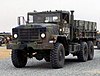 Корпус морской пехоты США 030224-M-XT622-034 5-тонный грузовой автомобиль USMC M923 (6X6) возглавляет колонну, отправляющуюся из лагеря Матильда, Кувейт crop.jpg