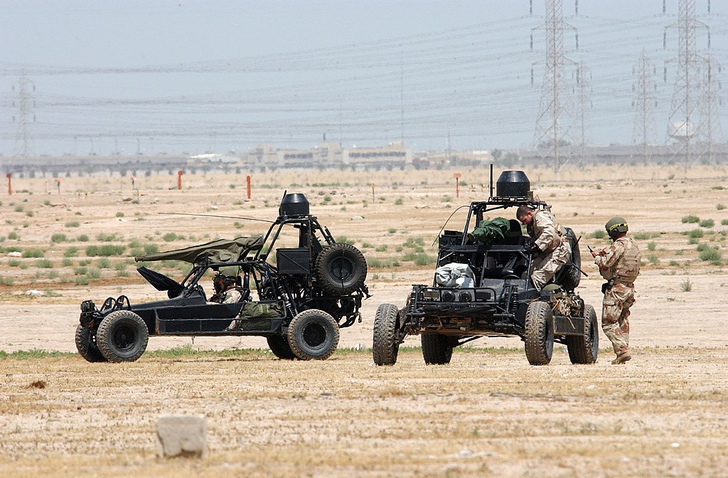 US Navy 020413-N-5362A-013 U.S. Navy SEALs (SEa, Air, Land) operate Desert Patrol Vehicles (DPV) while preparing for an upcoming mission.jpg