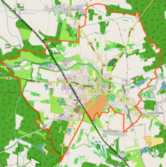 Mapa konturowa Wołowa, blisko centrum na prawo znajduje się punkt z opisem „Parafia św. Wawrzyńca”