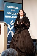 Historian Melinda Grube speaks in costume at CFI